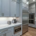 Refinished Cabinets with New Countertop and Backsplash
